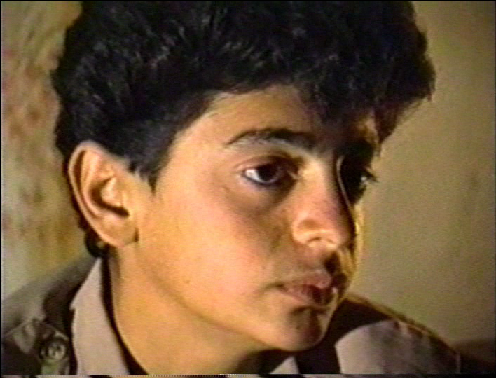 Taimor Abdallah Rokhzai in Nov. 1991 being interviewed by Kanan Makiya, showing in the 1992 TV documentary 'The Road to Hell' (shown on PBS in 1993 as 'Saddam's Killing Fields'). The only survivor of the Anfal mass-shootings, he was 12 in 1988. 