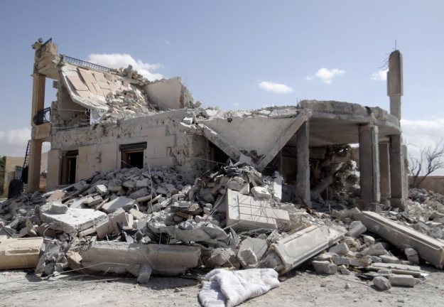 Aftermath of strikes on Jabhat an-Nusra's HQ in al-Muhandisin district of Aleppo City, Sept. 27, 2014
