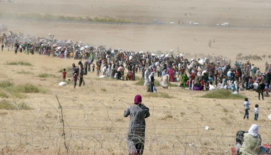 Kurds fleeing Kobani