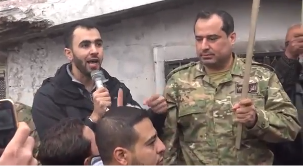 Journalist Hadi al-Abdallah and Division 13 commander Ahmad as-Saoud at an anti-Assad protest in Maarat an-Numan, March 4, 2016.