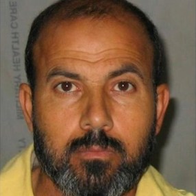 Picture of Adnan al-Suwaydawi after he was arrested in 2007.